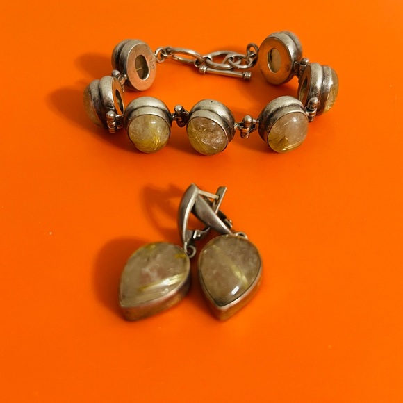 Elegant Silver and Gold-Toned Jewelry Set with earrings and bracelet. - Picture 1 of 8